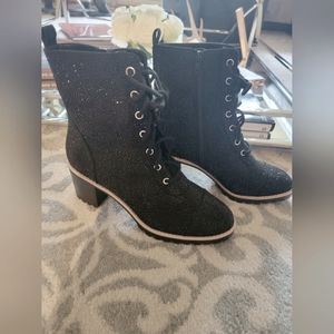 Black rhinestone combat boot style boots. Lace up. Size 10. Never worn